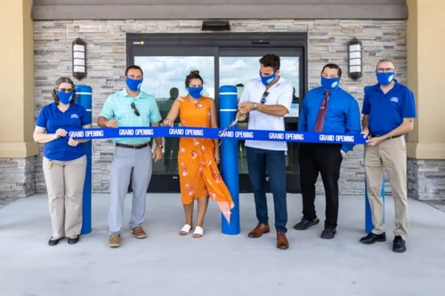 Employee ribbon cutting
