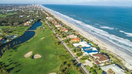 Aerial View of Ponte Vedra Beach, Jacksonville and a golf course near the shore.