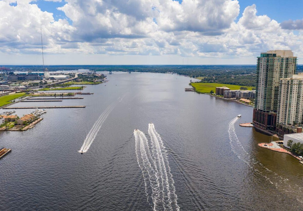 St. John’s River in Jacksonville, FL, on a bright day with fluffy clouds.